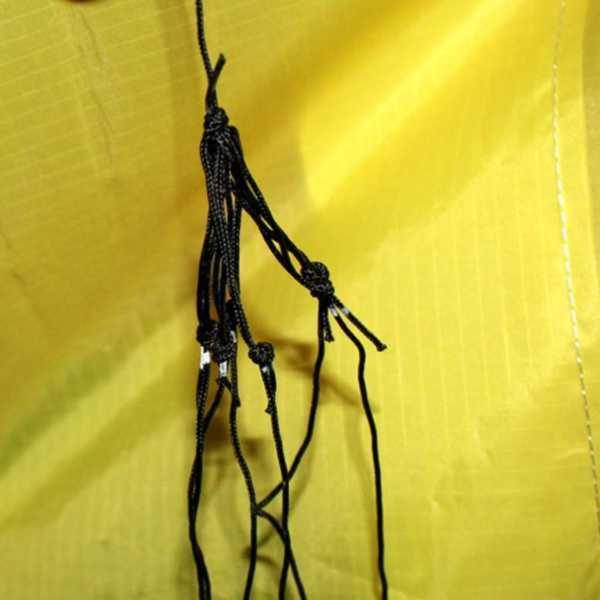 bridle strings joined together on yellow sailcloth on Addict power kite