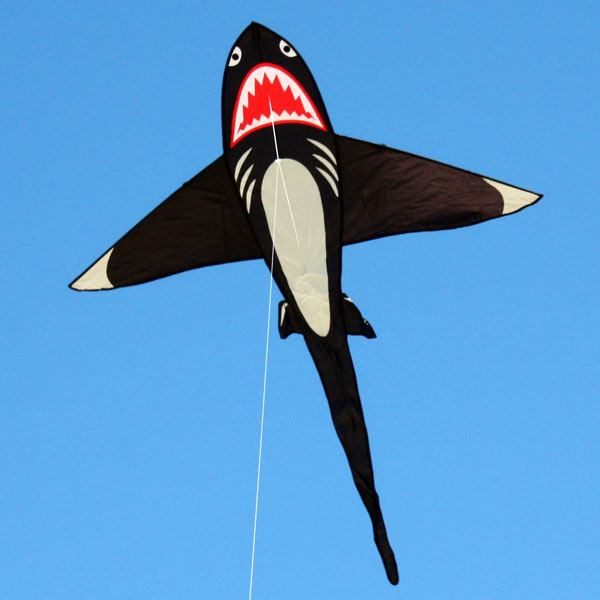 Shark shaped kite in the sky