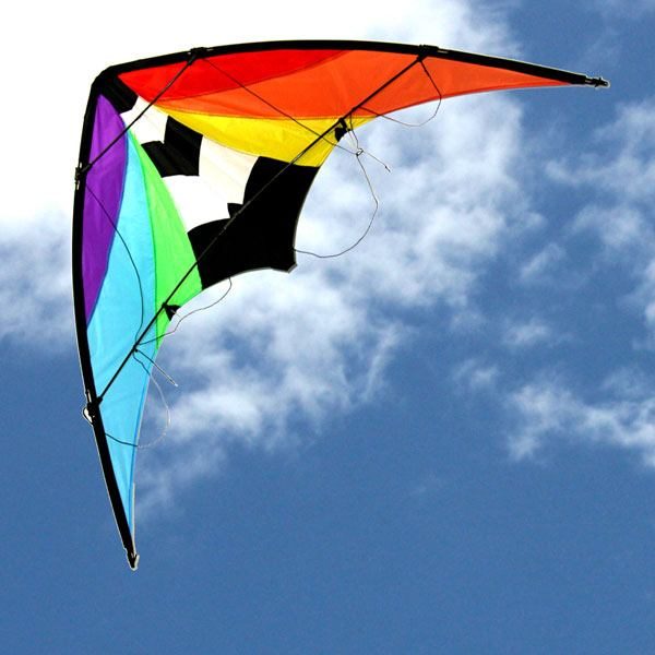 multi colored Stuntmaster dual control stunt kite in the sky
