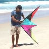 Wind Dancer dual control kite against teenagers to show size