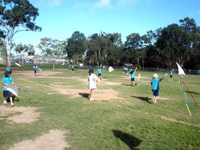 school children flying their make your own kite kitson the school oval
