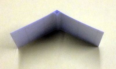 close up detail of sticky tab for kite making