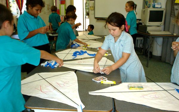 Small Kids Making Kites in School Activity