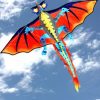 orange and blue dragon single string kids kite in flight