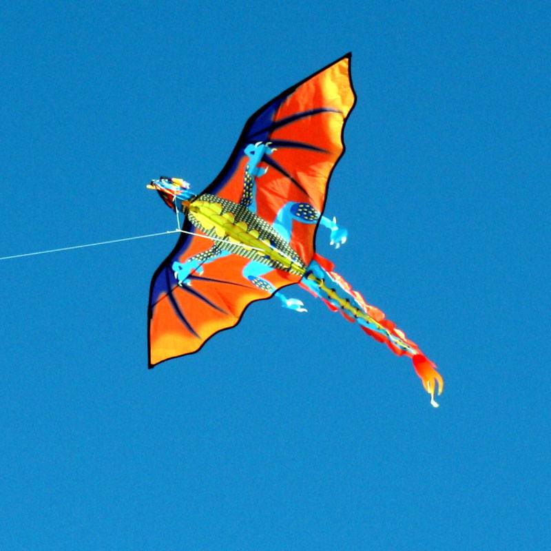 orange and blue Fire Dragon Single line kids kite in flight