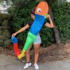 young lady holding a Wilma Worm kids kite to show off its 3.6 meter length