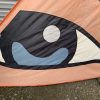 apliqued eye on a delta kite sail