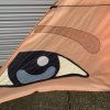 stitching detail on an orange delta kite sail