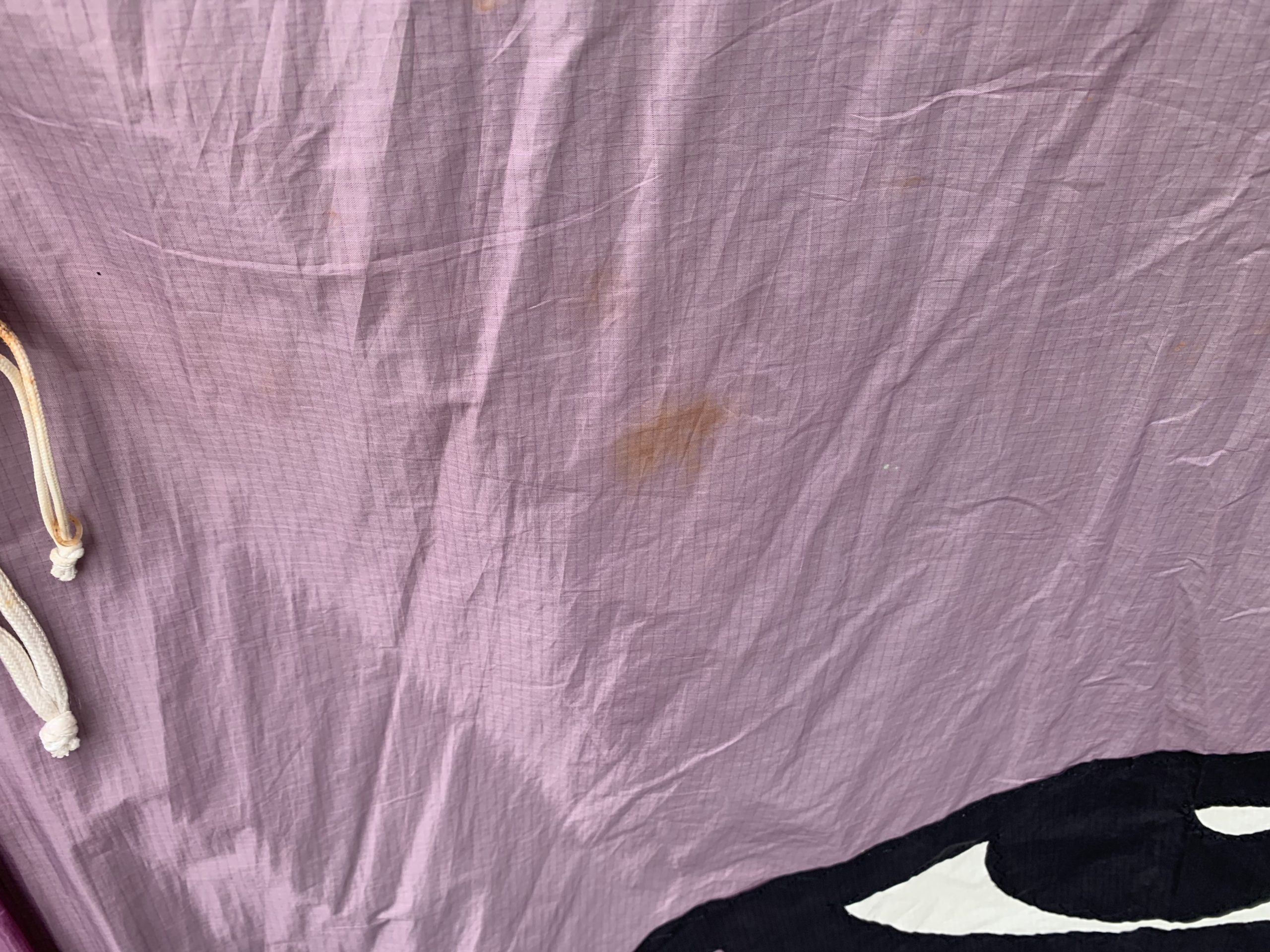 dirt stain on purple cloth