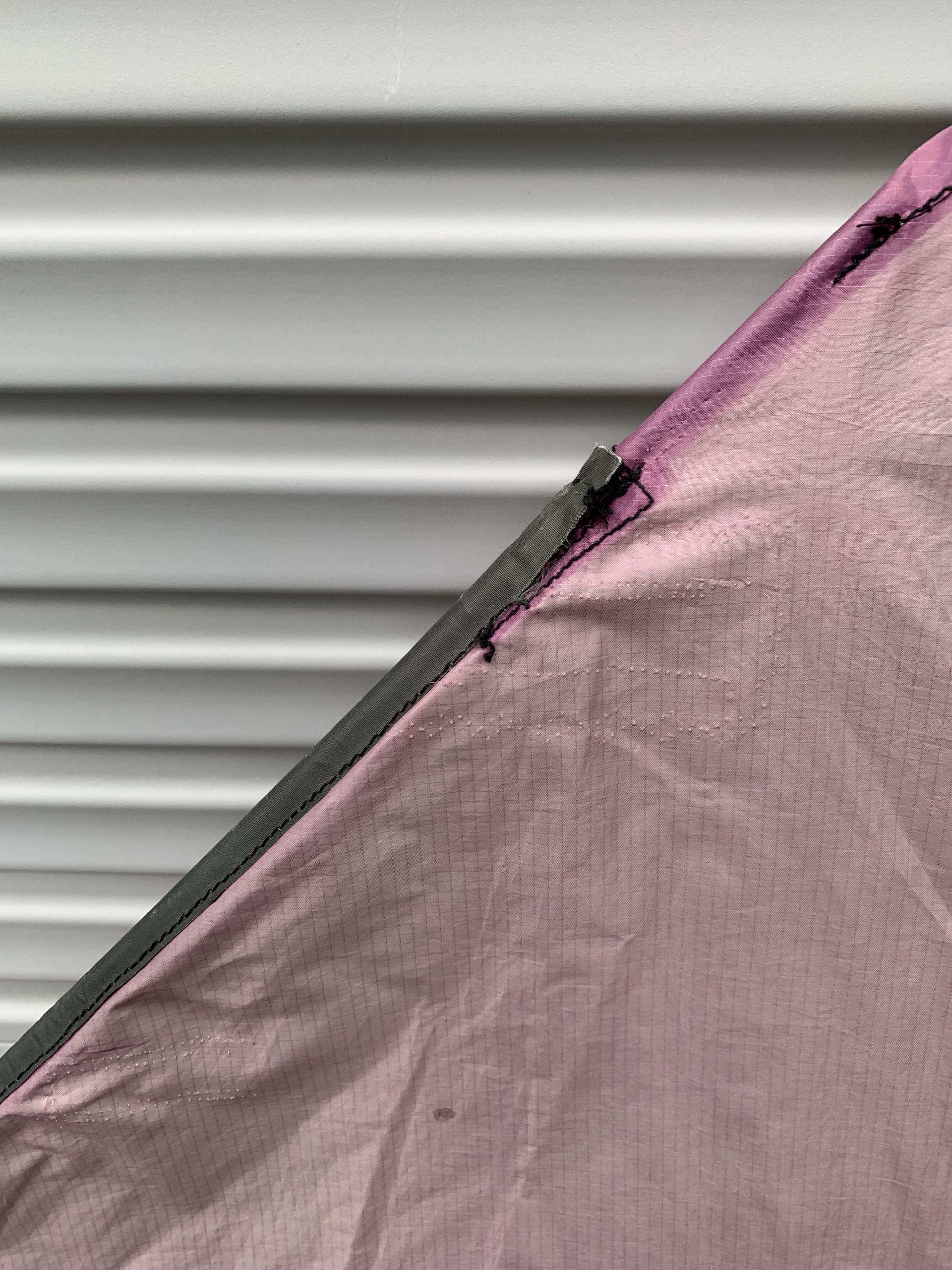 torn stitching on used kite