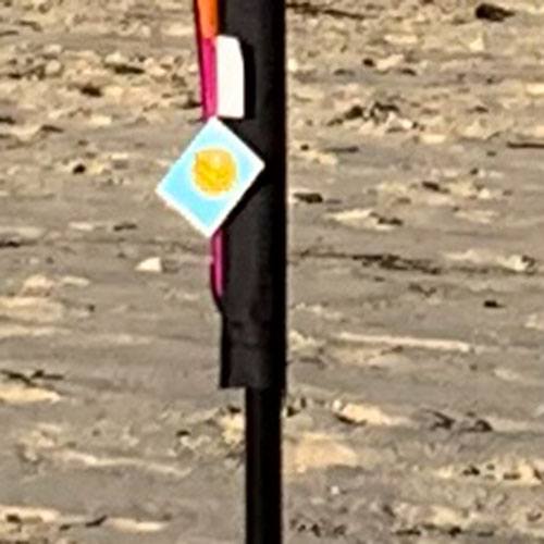 solar max cloth tag on a licorice banner