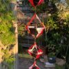 4 deluxe spinnies hanging in the garden