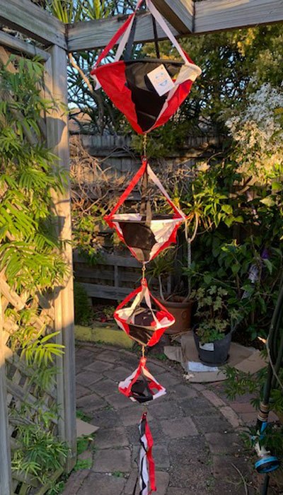 4 deluxe spinnies hanging in the garden