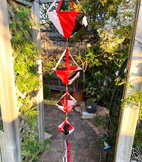 Diamond shaped kite with pink and rainbow unicorn print. Single String Kites for 4 Years and Up Kids