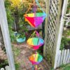 jumbo spinnie basket set hanging on a garden trellis