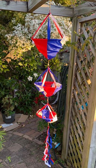 3 spinning baskets hanging in a row