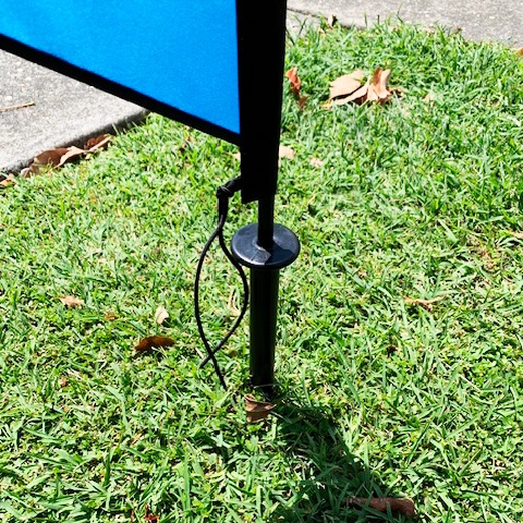 ground stake at base of feather pole